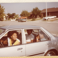 MAF0134_photo-of-two-women-and-one-young-man-in-car.jpg